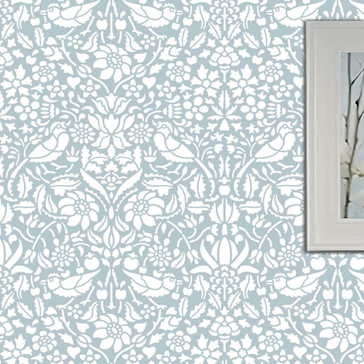 Birds and berries wall stencil shown in blue and white with birds and foliage in repeat motifs, ideal for DIY wall painting and interior decor.