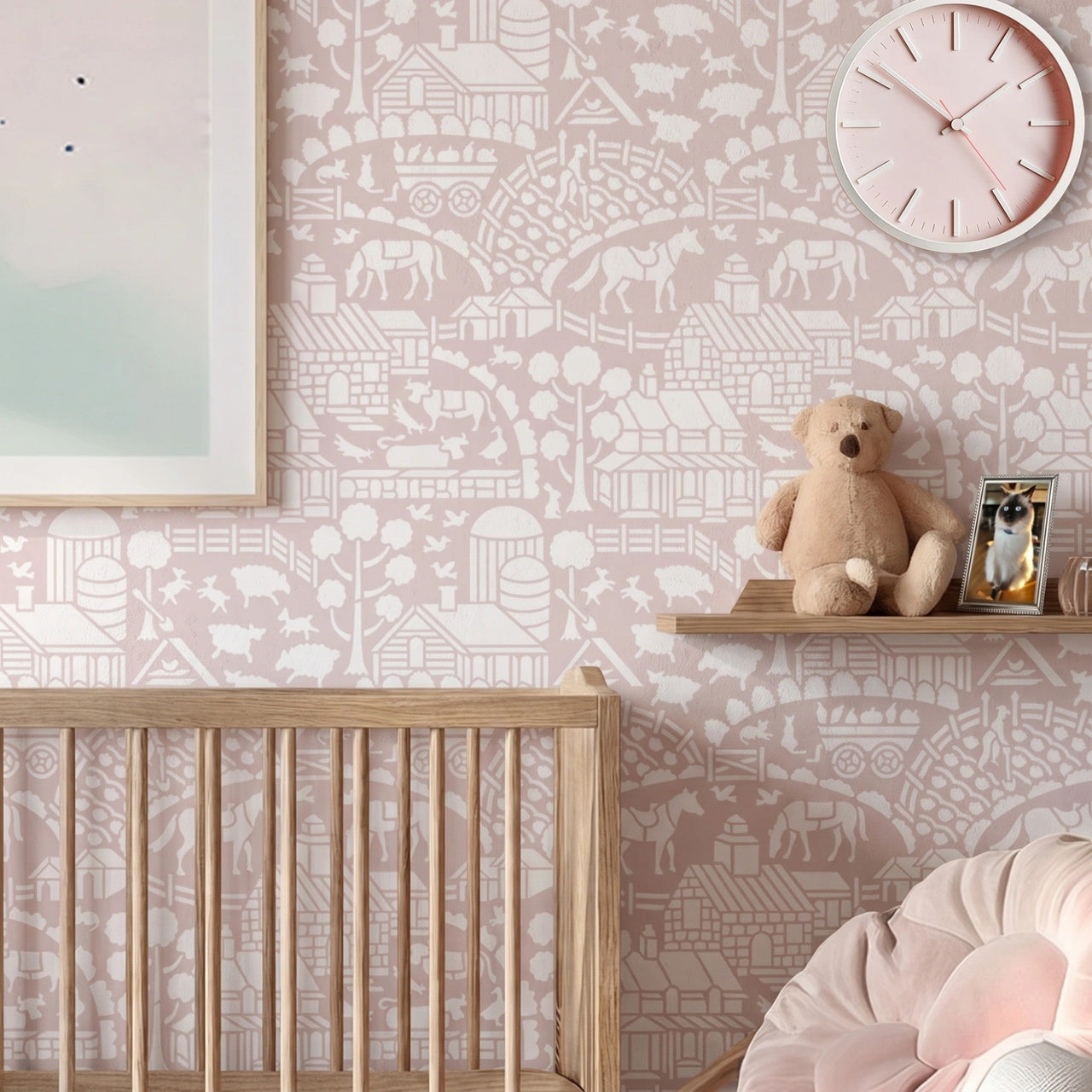 Day at the farm farmhouse wall stencil applied in a nursery with a crib, a clock on the wall, a shelf with a teddy bear, and natural light highlighting the light pink and white painted stencil on the wall.