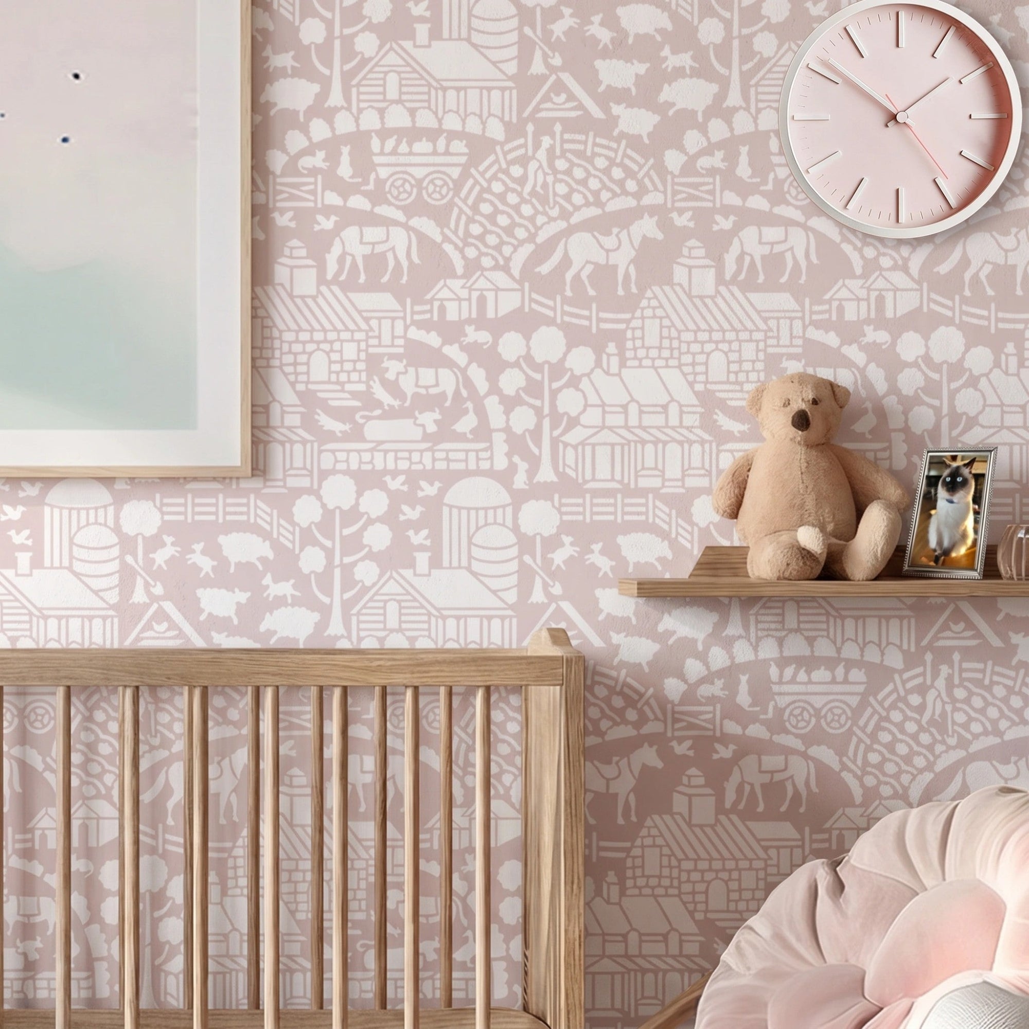 Day at the farm farmhouse wall stencil applied in a nursery with a crib, a clock on the wall, a shelf with a teddy bear, and natural light highlighting the light pink and white painted stencil on the wall.