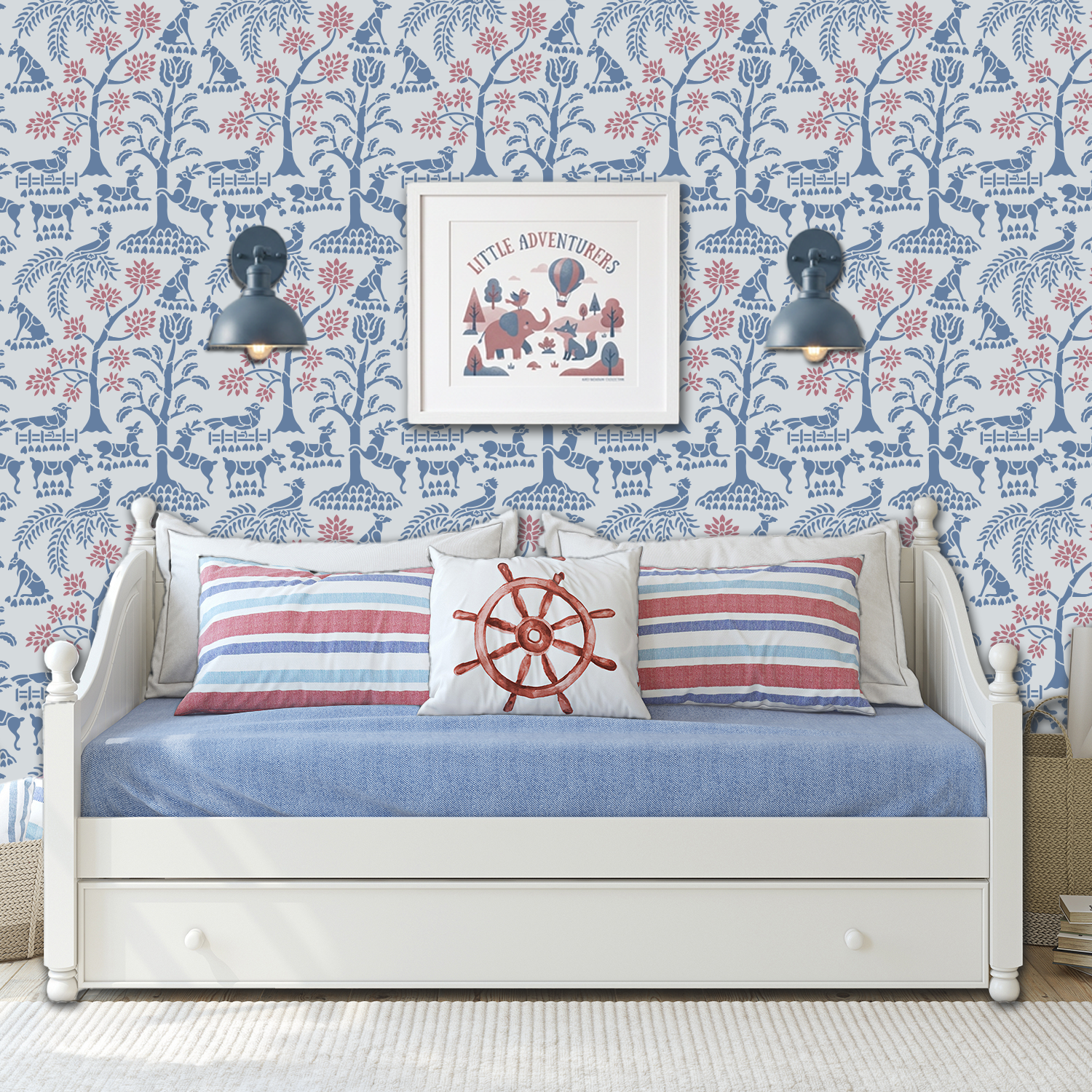 Enchanted forest wall stencil applied in a styled child's bedroom with a dark blue wall sconces mounted on it, a white day bed and framed artwork visible, and the wall scone in on and highlighting the blue and pink painted wall stencil on the wall.