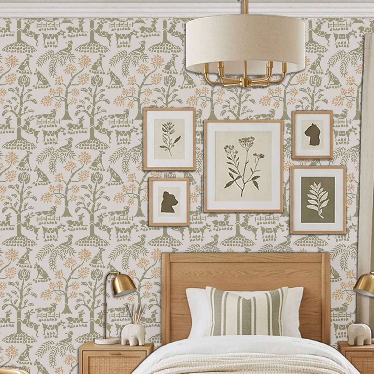 Enchanted forest wall stencil in a bedroom with a bed with a headboard , framed  prints hang on the wall, with a hanging drum lamp and bedside tables with lamps, and natural light highlighting the olive green and peach painted stencil on the wall.