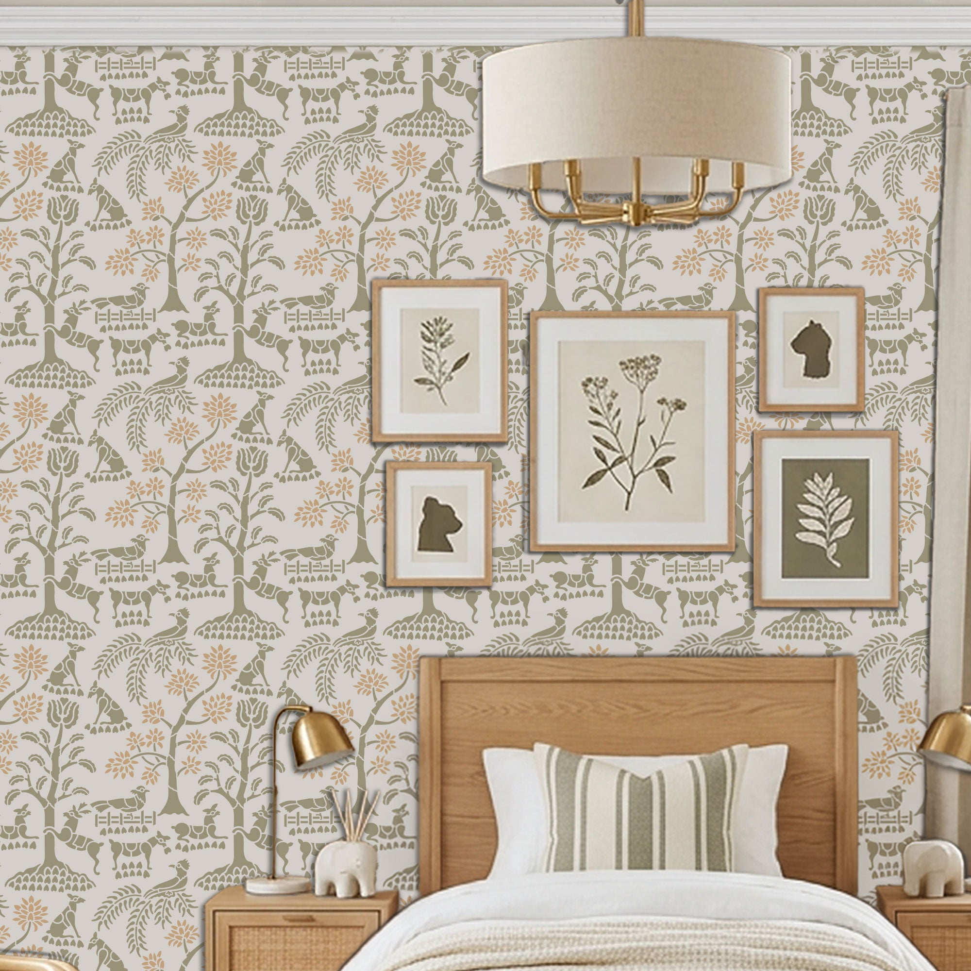 Enchanted forest wall stencil in a bedroom with a bed with a headboard , framed  prints hang on the wall, with a hanging drum lamp and bedside tables with lamps, and natural light highlighting the olive green and peach painted stencil on the wall.