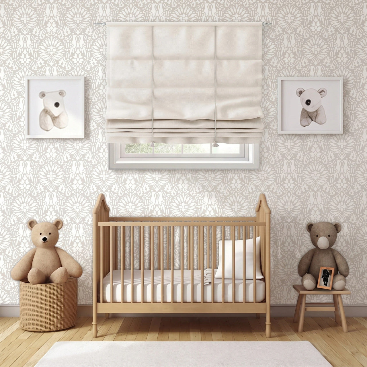 Morning Dove applied in a nursery room scene with a wood baby crib with white bedding, a cream Roman shade, two teddy bears, and framed bear illustrations on the wall, and natural light highlighting the beige and white painted stencil on the wall.