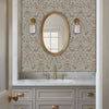 Birds and Berries wasll stencil in powder room. Woman enters, places towels on the countertop and exits video.