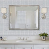 Bamboo wall stencil in powder room and woman walks in carrying towels video.