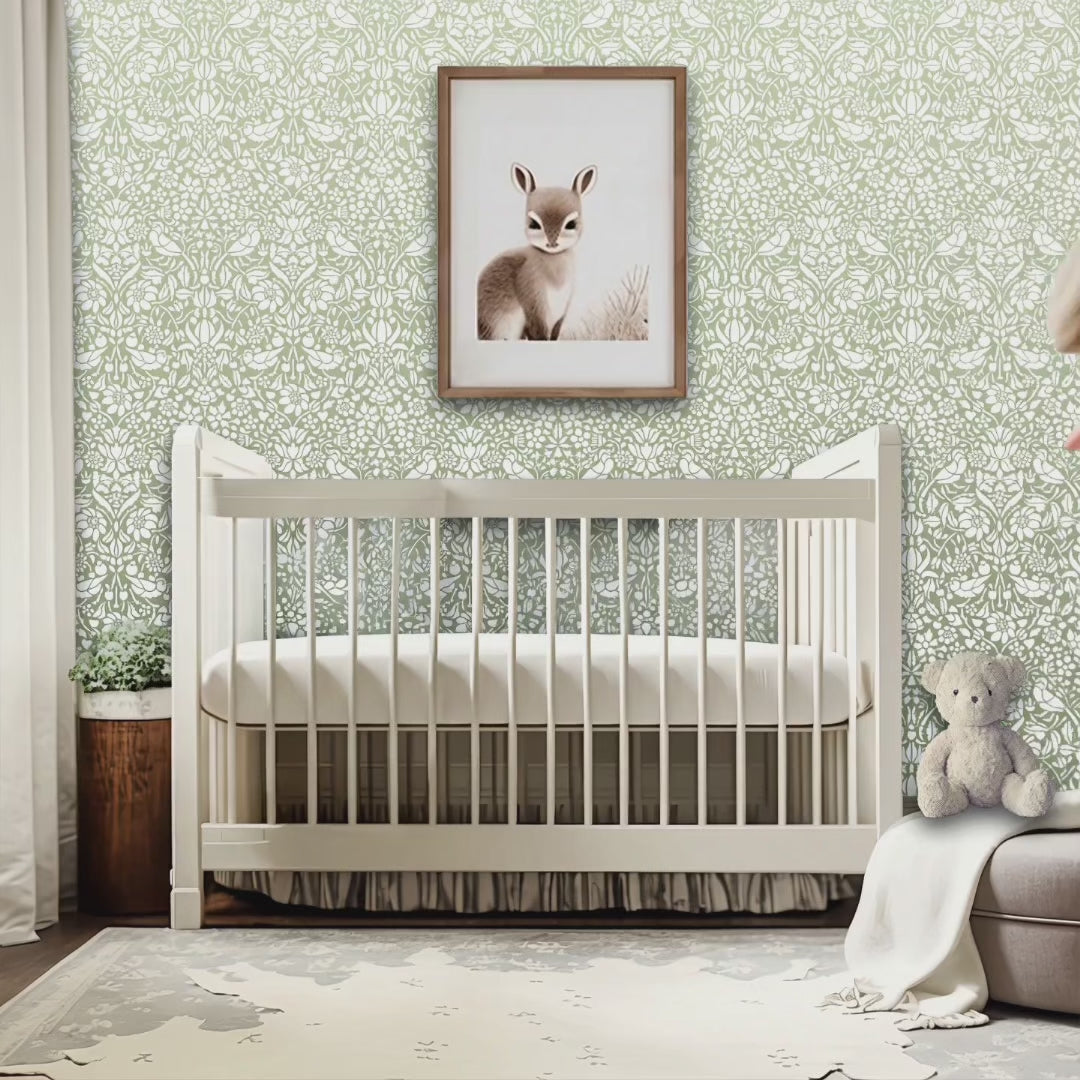 Birds and Berries wall stencil in nursery. Mother enters holding her baby, puts down the baby bottle, places the baby in the crib video.