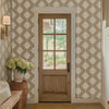Damask Block Print wall stencil video. Woman enters the front door with her dog.